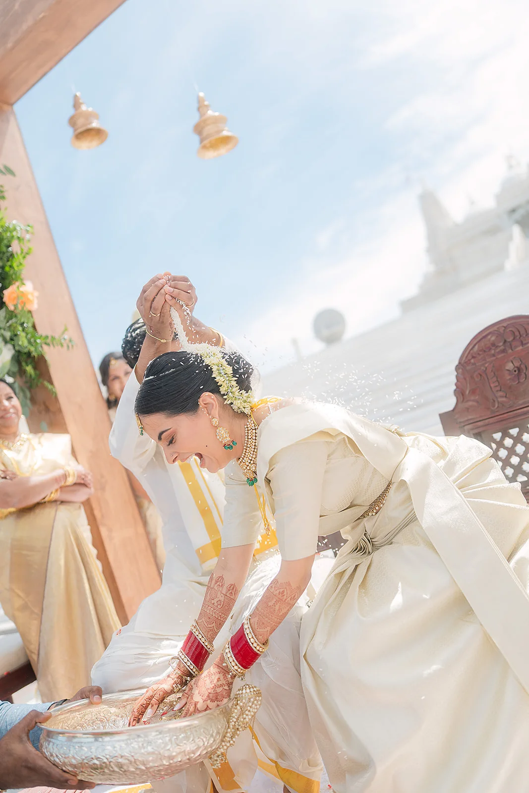 Family gathered around the couple during a wedding ritual
